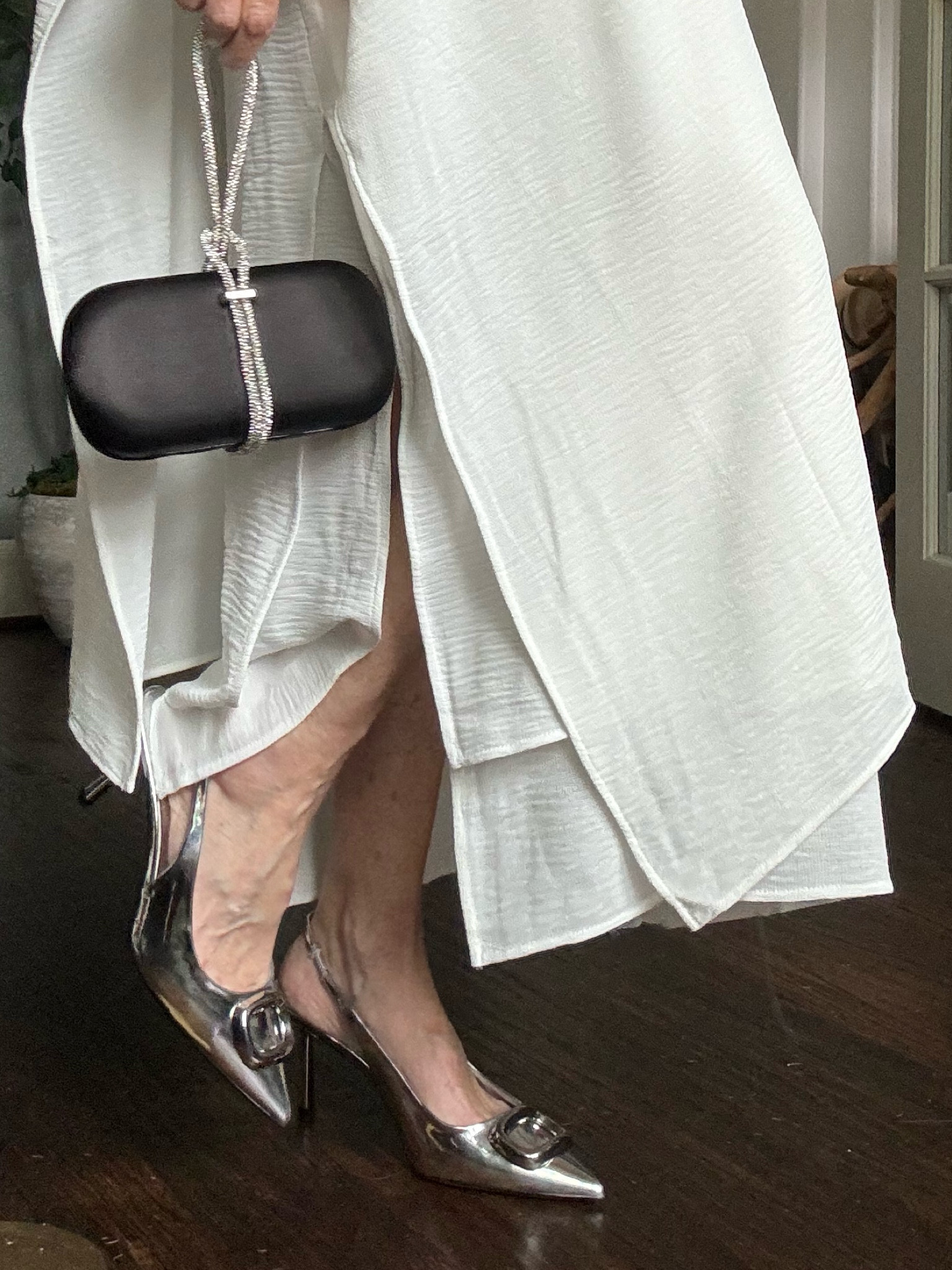 I take one pair of evening shoes on a trip.  I this case I chose silver and these heels are the perfect height about 3 inches. Here are some similar pieces I’m loving this little evening clutch it’s also the perfect price.  Happy hunting.

#LTKStyleTip #LTKTravel #LTKOver40