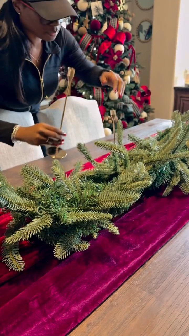 The table is where tradition meets intention.

I’ve always started decorating for the holidays early because it’s more than decor to me. It’s a tradition. A rhythm. A way to ground myself in joy before the season gets loud. There’s something about pulling out my holiday bins, fluffing out my trees, and styling decor around my home that calms my spirit and reminds me of everything I’m building for myself and my daughter.

This simple, traditional centerpiece is my ode to the classics. Greenery, candles,  and gold accents. No fuss. Just beauty and meaning.

Because at the end of the day, it’s not about perfection. It’s about presence.
 Save this for your own holiday table moment. 

#christmas2025 #SignedMalikaG #LifeInMy40s #interiordesign #diyhomedecor #interiorstylist #homedecor #housedesign #glamdecor #diyhomedecor #homeinspo #luxurydecor #homesweethome #diyprojects #diy #diydecor #homestylinginspo #decorlovers #ighomestyling #christmasdecor #christmas #christmastree #dallasinfluencer #dallascontentcreator #dallasblogger #DallasLifestyleCreator #HolidayDecor #TraditionalChristmas  #kingofchristmas#kingofchristmas #pledge
