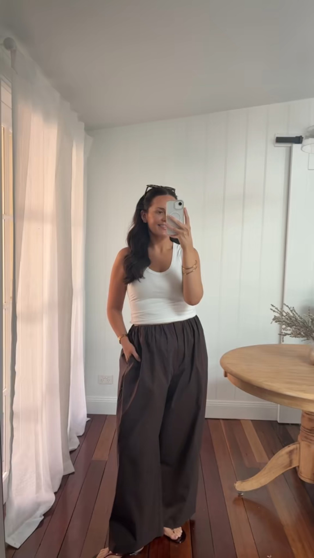 low rise super baggy pants with a white tank top 🥥🤎 

#LTKaustralia #LTKmidsize #LTKsummer