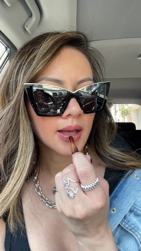 Anyone else listening to the new @taylorswift album on repeat? 🙋🏻‍♀️ #swiftie Extra time in the car to apply my newest lip obsession from @raviebeauty. Shade is Dahlia 💄

Lipstick, sunglasses, earrings, necklace, rings, silver jewelry, bodysuit, denim jacket, The Stylizt 



#LTKstyletip #LTKfindsunder50 #LTKitbag