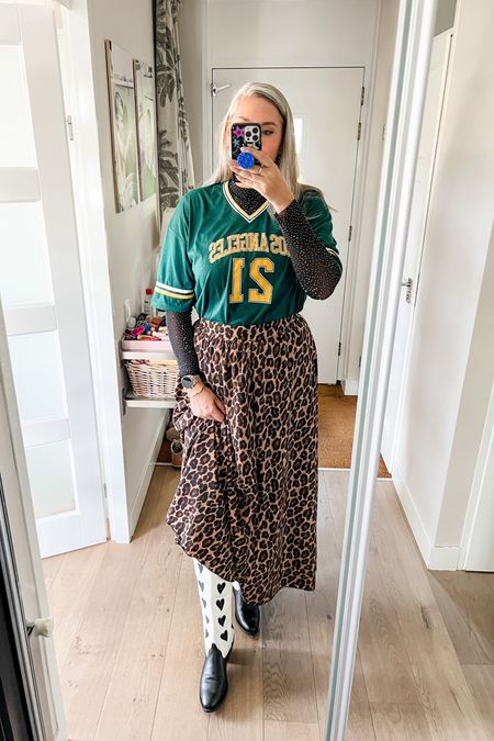 Ootd - Tuesday. Leopard print maxi skirt paired with a green American Football style shirt over a mesh glitter top (old) and black and white western boots from bootstock. 



#LTKmidsize #LTKstyletip #LTKeurope
