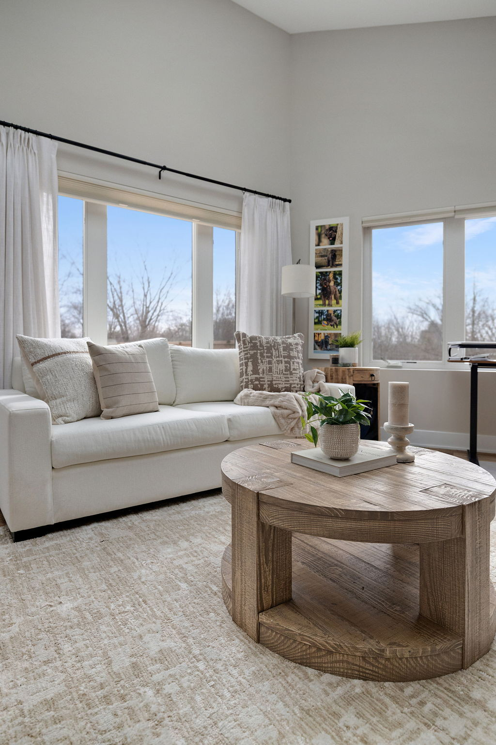 For an office that doubles as a sitting room, we stacked function with comfort. A small coffee table that would eventually store games for game day, a chic (and affordable) couch in a performance fabric to withstand pets, a textured rug and pillows to bring the whole space together. 

Not pictured: coordinating corner shelves for books, trinkets, and additional storage.  

 #LTKSeasonal #LTKHome #LTKSaleAlert