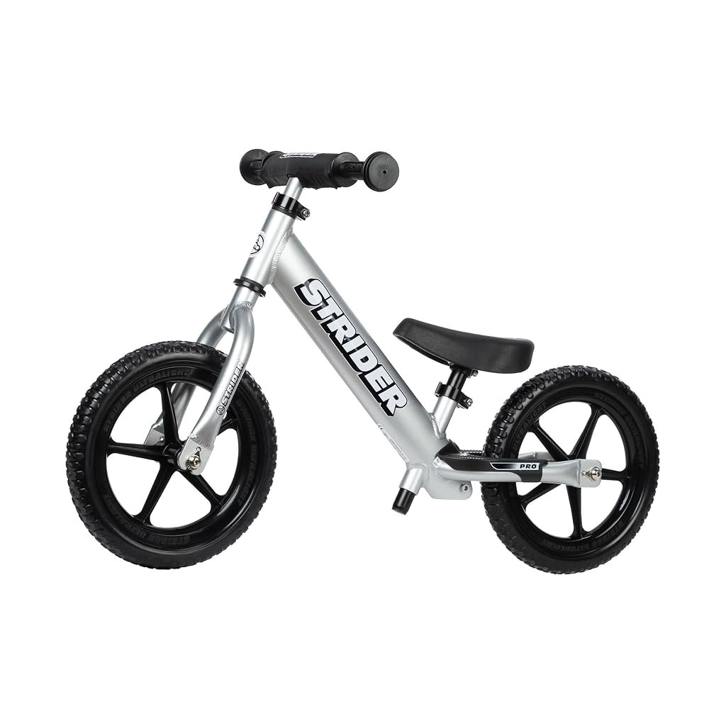 Strider 12” Pro Bike - No Pedal Balance Bicycle for Kids 1 to 4 Years - Includes Safety Pad, Pa... | Amazon (US)