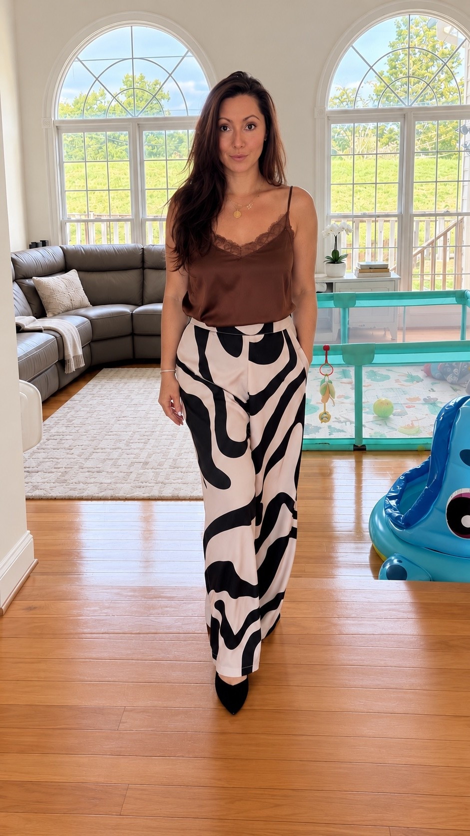 An easy outfit that feels dressed up without trying too hard. 🤎 Satin cami, statement wide-leg pants and simple accessories for an effortless everyday look. Save for outfit inspiration and shop my look and similar finds through LTK.