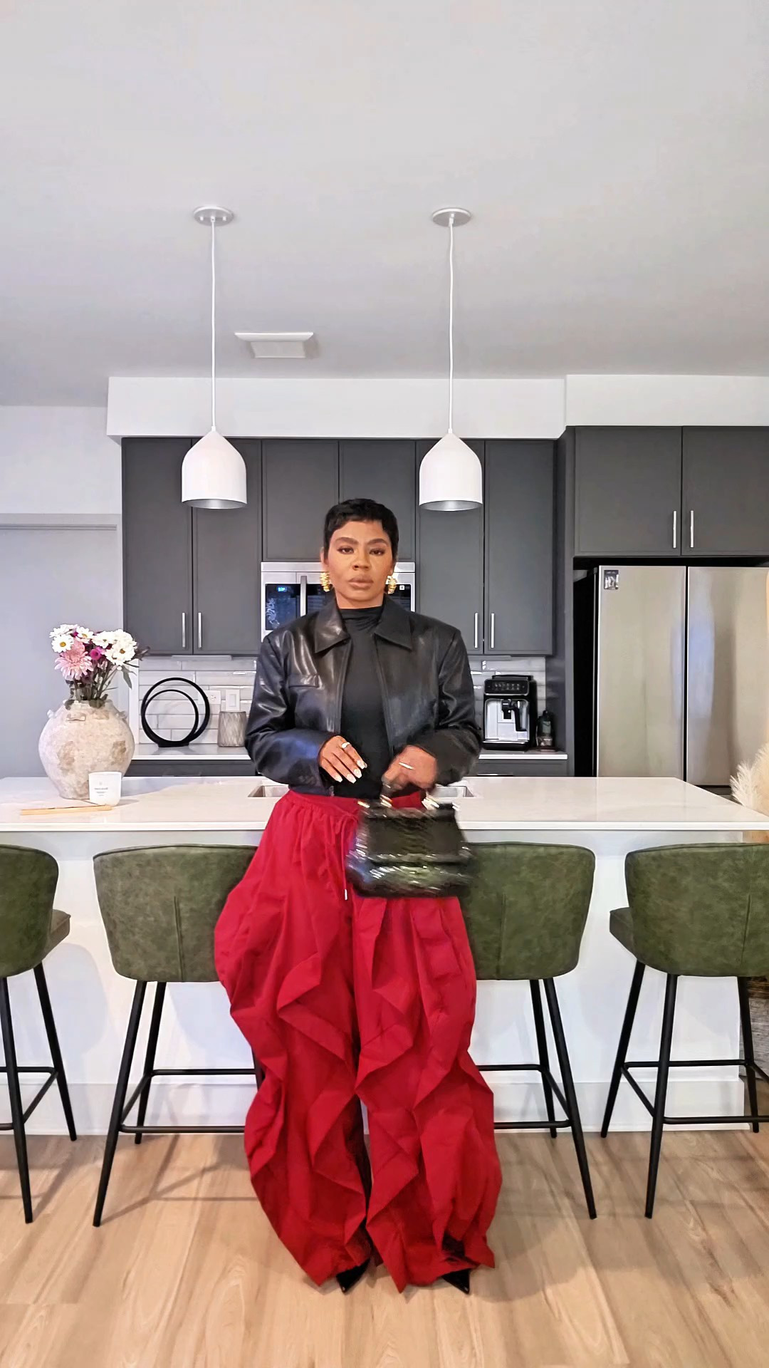 Casual Valentines Day Outfit This Valentine’s Day outfit is proof you don’t need a dress. Wide-leg, flowy pants paired with red and black tones make a statement while still feeling casual, elevated, chic, and completely wearable. Perfect for a casual Valentine’s date, dinner plans, or a night out when you want to feel confident but comfortable.Styled with black pointy-toe heels from Zara and a snakeprint top-handle bag to keep the look polished.Styling tip: If you’re wearing wide-leg pants, keep the shoe sleek and pointed to balance the volume and elongate the leg.Valentine’s Day outfit ideas | casual date night outfit | wide leg pants outfit | elevated casual style | streetwear chic

#LTKootd #LTKgrwm #LTKPetite