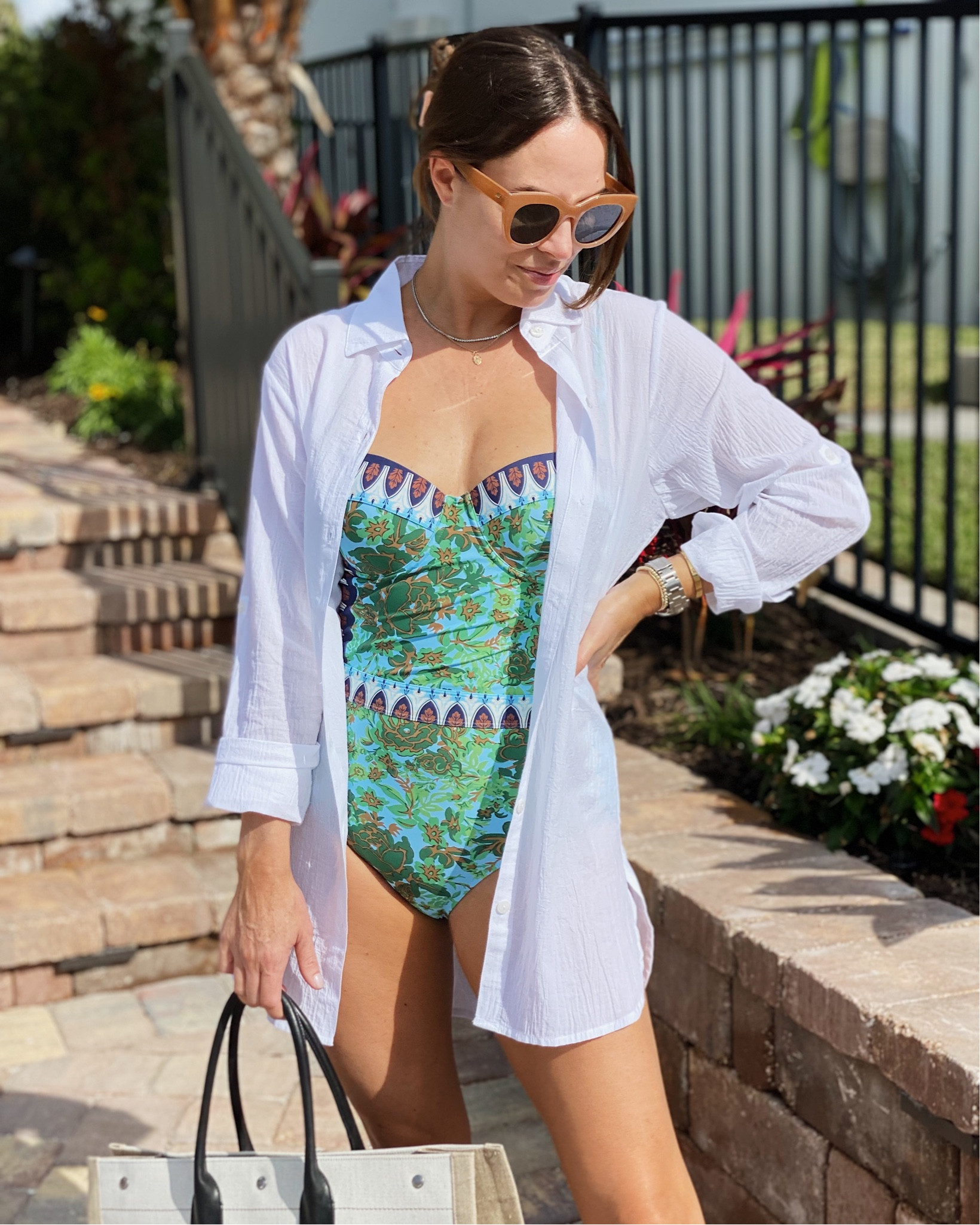 Tory Burch one piece in stock in a few sizes! I’m wearing a M. White coverup size small, YSL beach bag 

#LTKswim #LTKSeasonal #LTKunder100