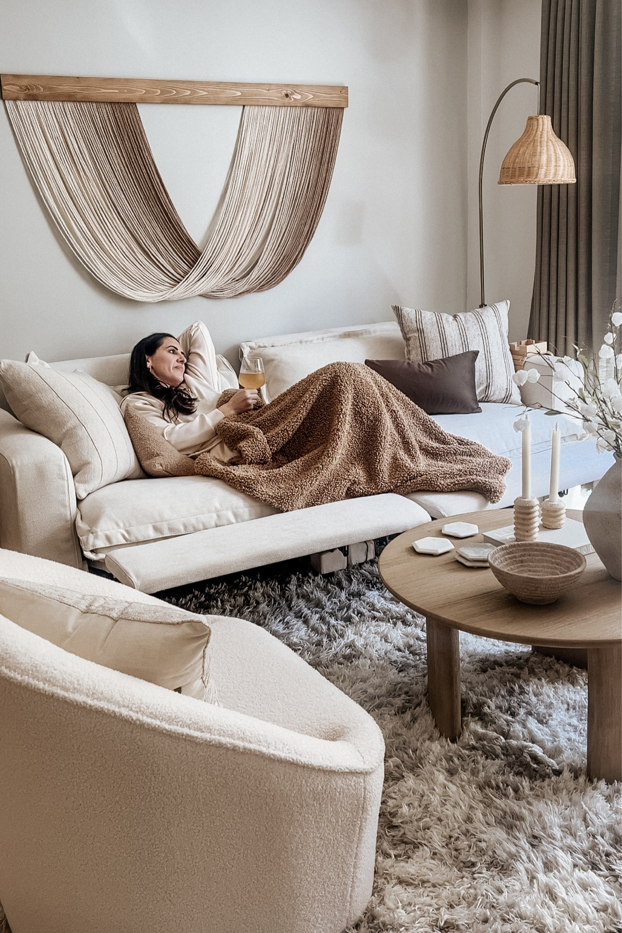 cozy Saturday vibes 

White sofa, reclining sofa, living room decor, neutral living room, throw blanket, boucle swivel accent chair, coffee table, fiber art, boho art, floor lamp, candle holders, decorative bowl, decorative vase, coasters, throw pillows 

#LTKhome