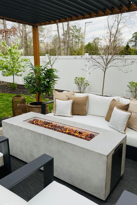 Shop my stunning concrete outdoor firepit in this landscape size and make a statement on your patio! I love that it comes with a built in compartment to store away your gas tank so you don’t see any pipes or gas tanks for a sleek and clean look!

You guys sold it out the first time I shared but it’s back in stock so run!!! Makes the perfect mother’s day gift as well!

Outdoor gas firepit
Firepit with built in gas tank 
Modern concrete firepit 
Wayfair finds 

#LTKGiftGuide #LTKSeasonal #LTKhome