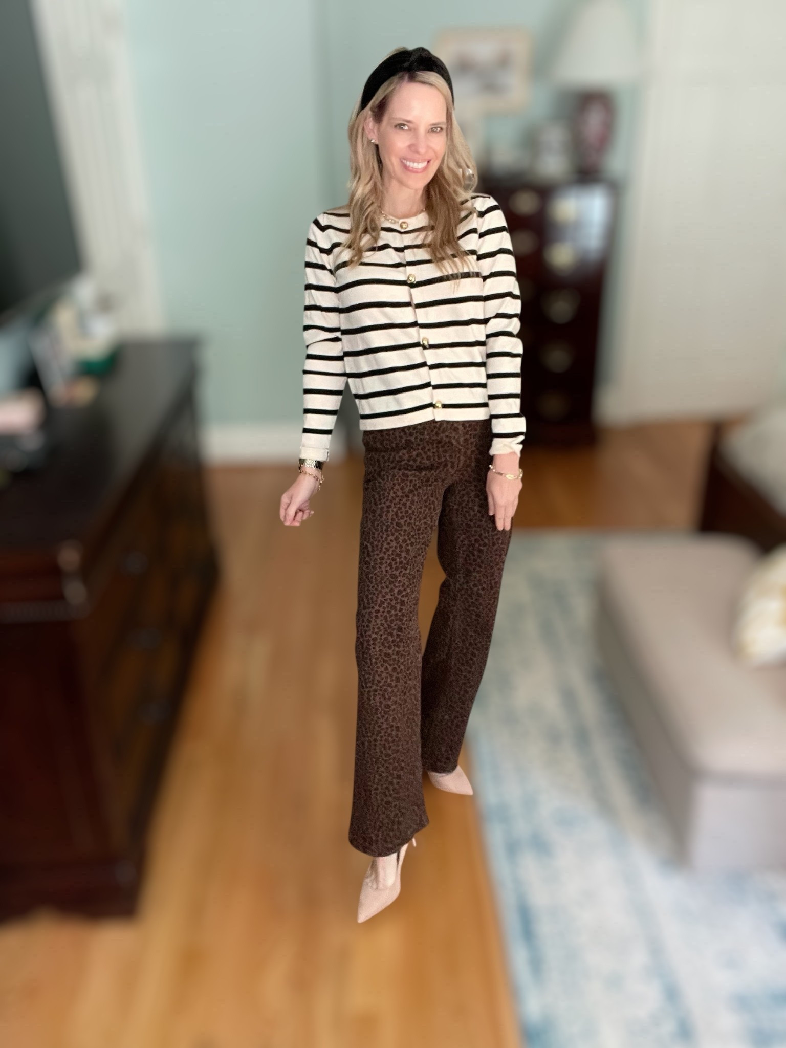 🐆 Mixing prints the chic way! This striped Amazon cardigan is such a timeless piece, and I paired it with leopard flare pants for a bold, fashion-forward twist. The combo feels polished yet playful, perfect for fall dinners, casual work looks, or weekend outings.

To keep it classic, I added neutral pointed-toe pumps for lengthening the legs and a black velvet knotted headband for that touch of polish. Gold jewelry (including the Ahava Jewels Zodiac Tennis Bracelet ✨) and my everyday Abbott Lyon two-tone pearl watch pull the look together with shine.

This outfit proves that stripes + leopard = a match made in style heaven. Effortless, affordable, and so easy to recreate! 🍂

⸻

 striped cardigan outfit, fall outfit with stripes and leopard, Amazon striped cardigan, leopard flare pants outfit, fall workwear ideas, mixing prints outfit, fall fashion 2025, preppy chic fall look, neutral pointed toe heels, velvet headband accessory, Ahava Zodiac Tennis Bracelet, Abbott Lyon watch


#LTKWorkwear #LTKFindsUnder50 #LTKFindsUnder100