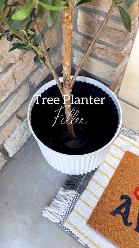Comment: Shop for the links 
Ok I love using faux trees and plants in my courtyard! But I hate how the planters look with the faux tree in it! So I love doing this little DIY trick to make it look full!  It’s quick and easy!! Have you tried this before? 

#LTKhome #LTKsalealert #LTKFind