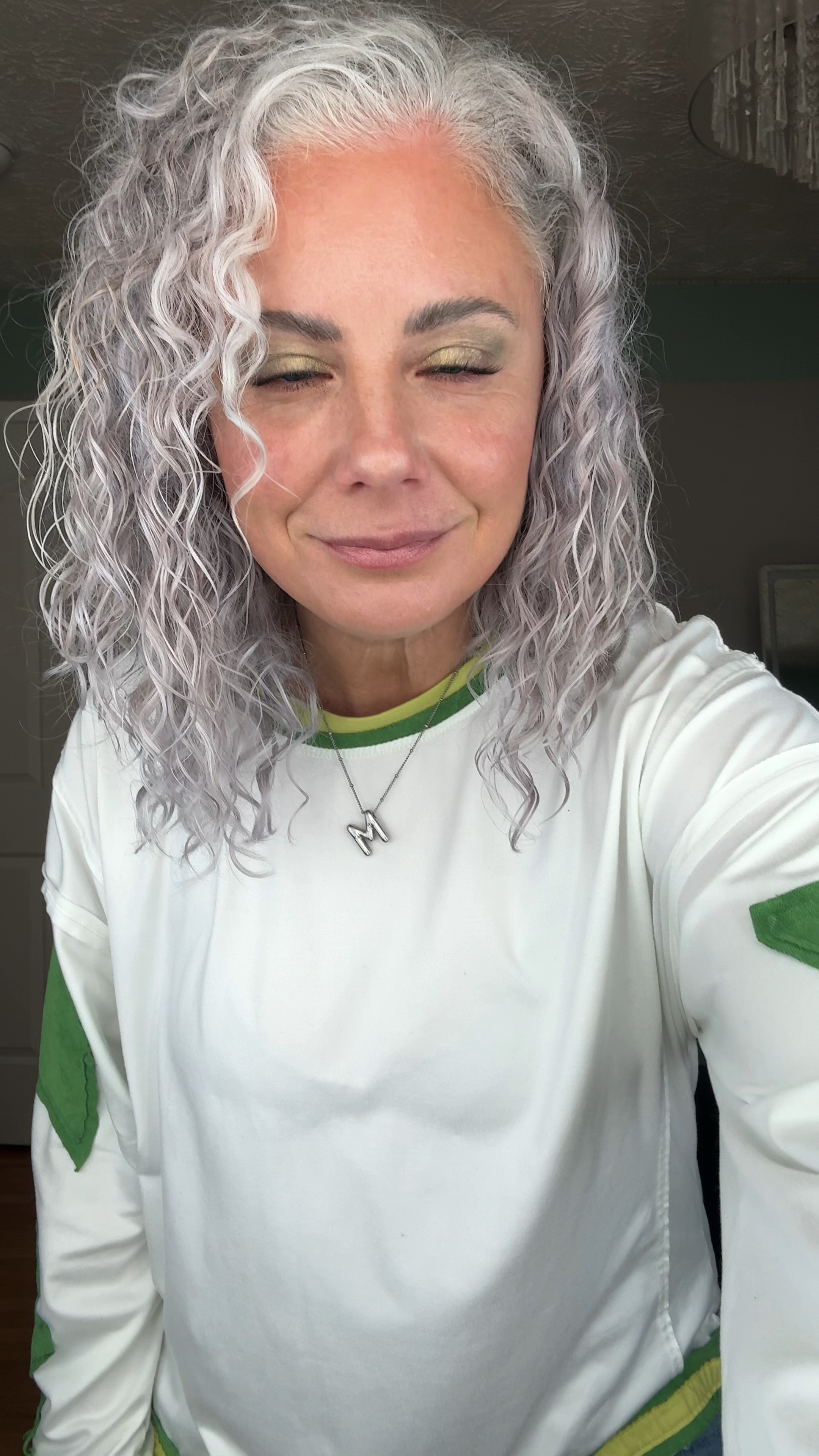 Obsessed with this casual-chic look! ✨ This white shirt with green accents and velvet-feeling stars pairs perfectly with these comfy barrel jeans. Finished it off with a silver bubble letter initial necklace for a playful touch. Shop the full look on my LTK! #OOTD #LTKstyletip #CasualChic #EffortlessStyle #FashionInspo #TrendAlert #StyleDiary #VelvetDetails #StreetStyle #EverydayOutfit

#LTKOver40