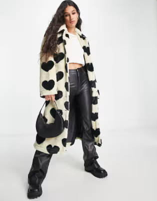 Pieces faux fur coat & bucket hat in black & white heart print | ASOS (Global)