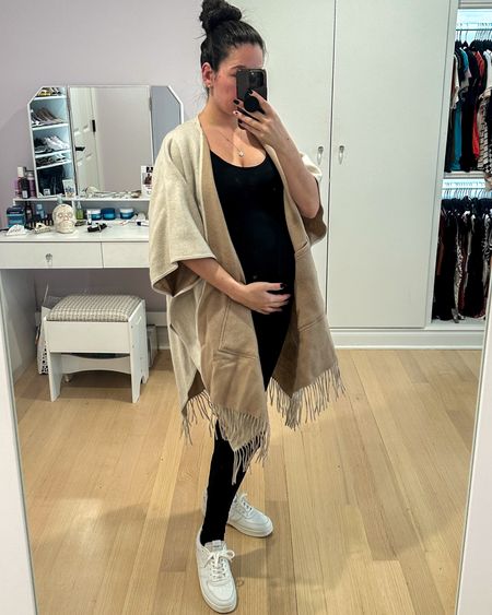 Another maternity outfit that is great for running errands but also staying cozy during the fall and winter months. The poncho is reversible and very warm. Wear long sleeves under it for extra coverage. 

#LTKfindsunder100 #LTKSeasonal #LTKbump