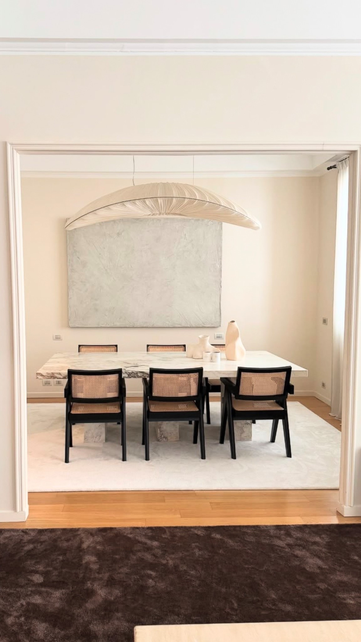 The most compact and neutral toned color dining room with the most beautiful ceiling lamp, that makes the room more intimate

#LTKHome #LTKFindsUnder100 #LTKSaleAlert