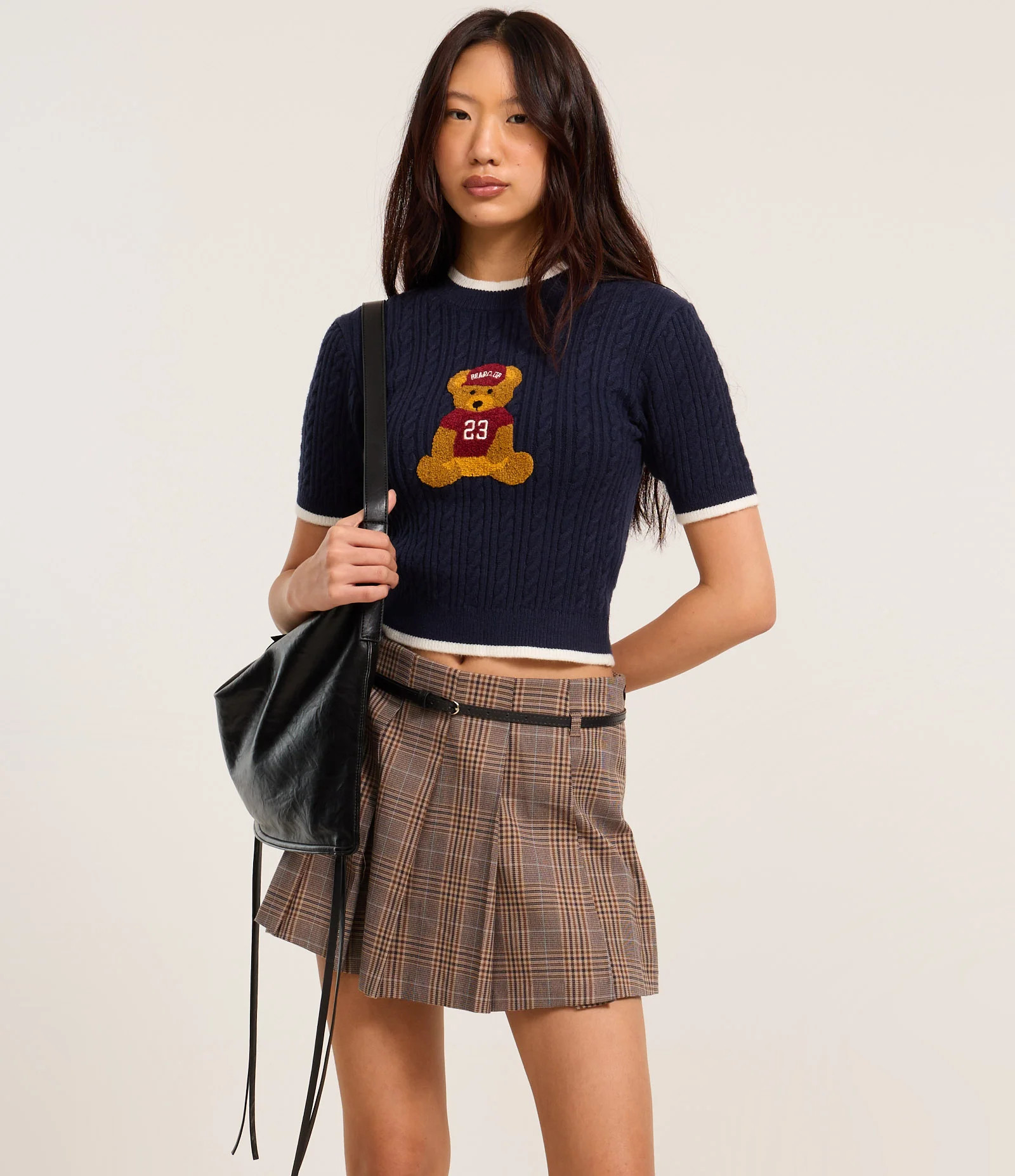 Short Saia em Alfaiataria Xadrez e Plissada Marrom - Lojas Renner | Renner (BR)