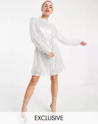 In The Style exclusive sequin tie waist volume sleeve oversized mini dress in silver | ASOS (Global)