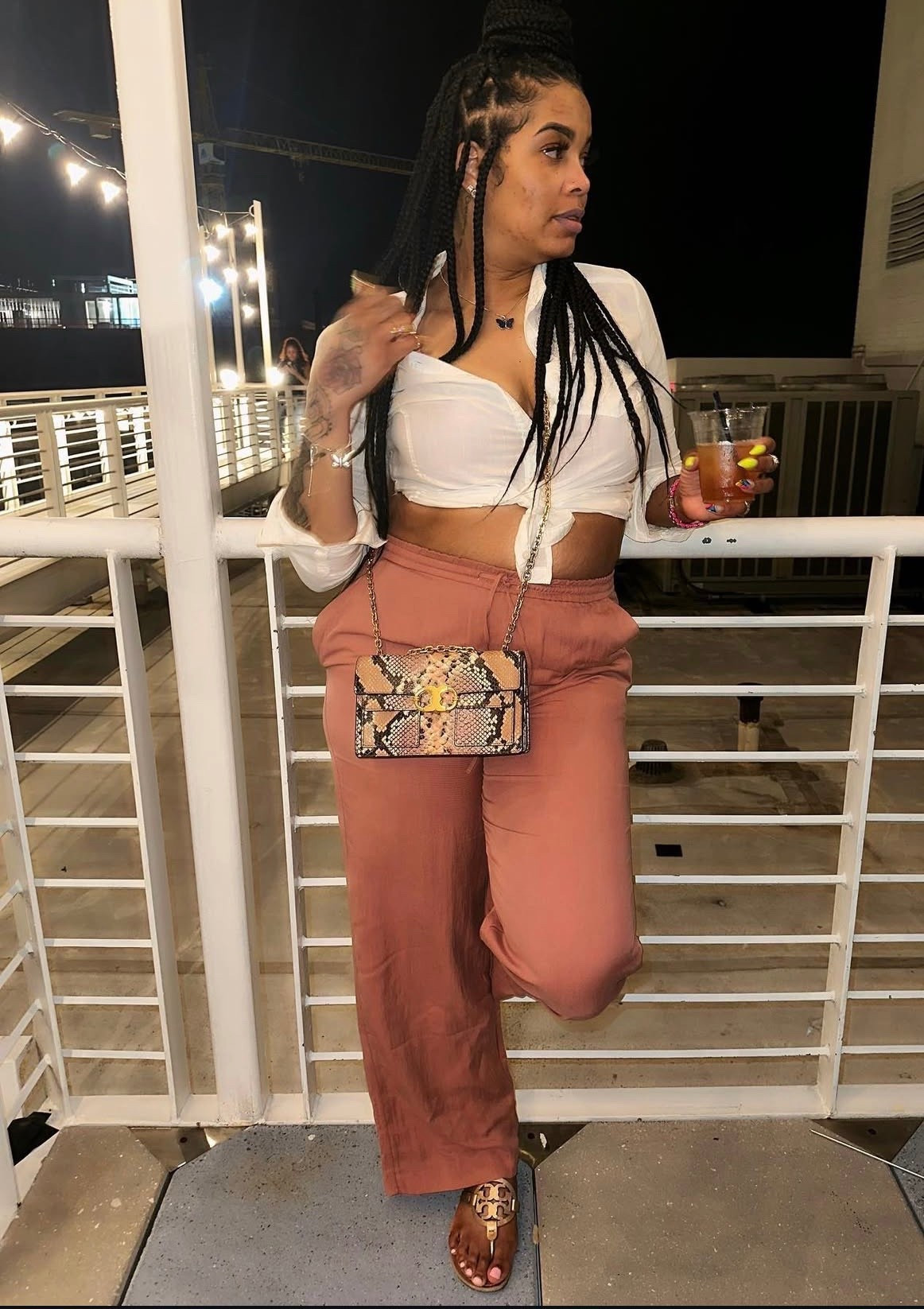 A soft, elevated night look with warm tones. A cropped top paired with flowy trousers, neutral sandals, and a statement crossbody for an effortless finish.

#LTKstyle #LTKnightout #LTKootd
