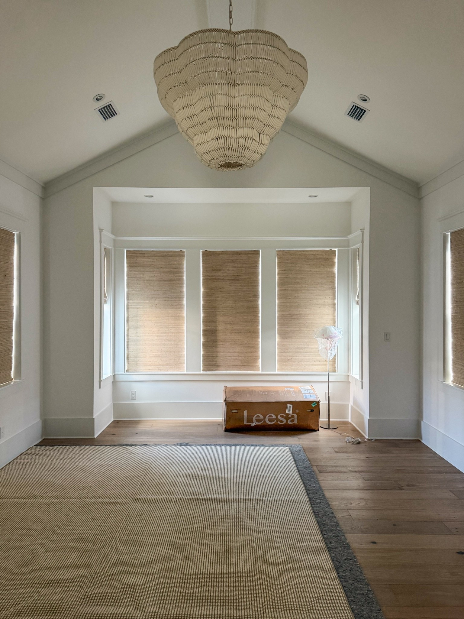 Slowly getting our new bedroom put together! We’re letting the rug “rest” over night before we set up the bed. Technically just using a a bed frame for now because the “real” bed is back ordered! The shade material is the “Bonaire Flaxen” and we did the automated shades in this room! See my full design board here: https://lifeonvirginiastreet.com/classic-coastal-master-bedroom-bathroom-design-plans/

#LTKHome #LTKSeasonal #LTKSaleAlert