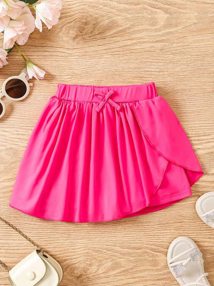 SHEIN Young Girl Summer Casual Solid Color Asymmetric Hem Mini Skirt Shorts | SHEIN