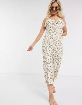 ASOS DESIGN cami tie front jumpsuit in yellow floral print | ASOS (Global)