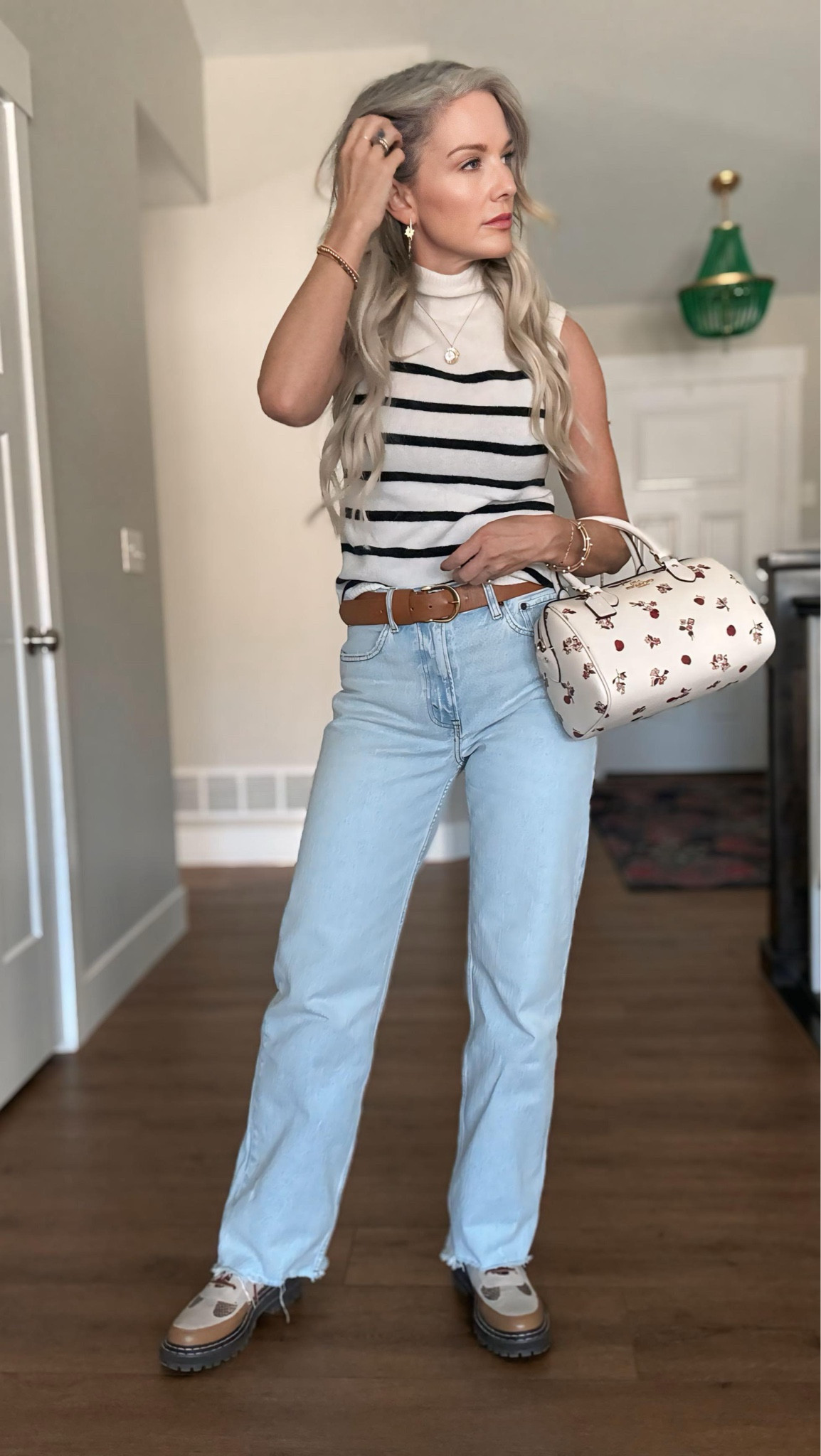 Falling for the perfect fall look! 🍂 let me know what links you want!! Rocking these Abercrombie 90s jeans in a light wash with a sleek sleeveless turtleneck sweater for a chic, effortless vibe. The cropped trench jacket is this season’s must-have, and I’m loving the touch of sparkle from @baublebar earrings and bracelets. Finished the look with a classic Coach bag for the ultimate fall ensemble. Ready to step up your style game? Follow @movewithmeidaho and elevate your wardrobe! #FallFashion #Abercrombie #90sJeans #TurtleneckSweater #CroppedTrench #TrenchCoat #CoachBag #BobbleBar #FallStyle #FashionInspo #OOTD #StreetStyle #StyleGoals #TrendAlert #FashionForward