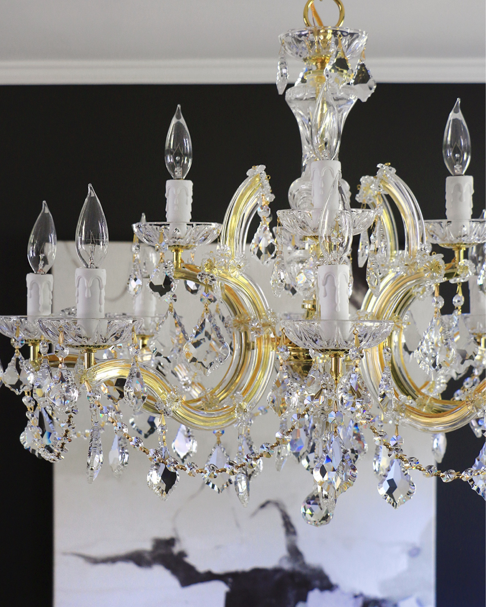 Gold chandelier with the charm of old world chandeliers, but a more contemporary touch

#LTKHome