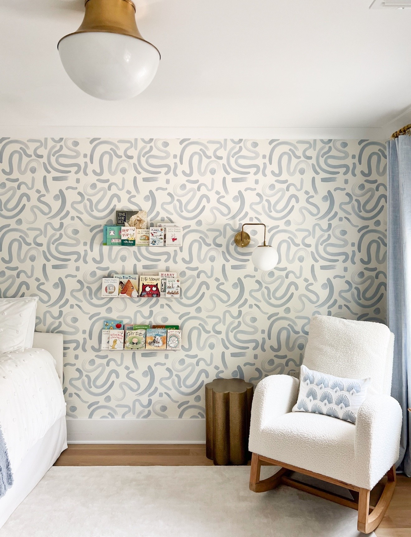 Throwing it back to this sweet nursery that I designed a few years ago. I still love it just as much as I did back then! Wallpaper makes a room feel so special ❤️

Boy’s nursery, gender neutral nursery wallpaper, Pepper Home wallpaper, crate & kids bedroom furniture, acrylic bookshelves, boucle rocking chair, brass side table, Serena & Lily 

#LTKKids #LTKHome #LTKBaby