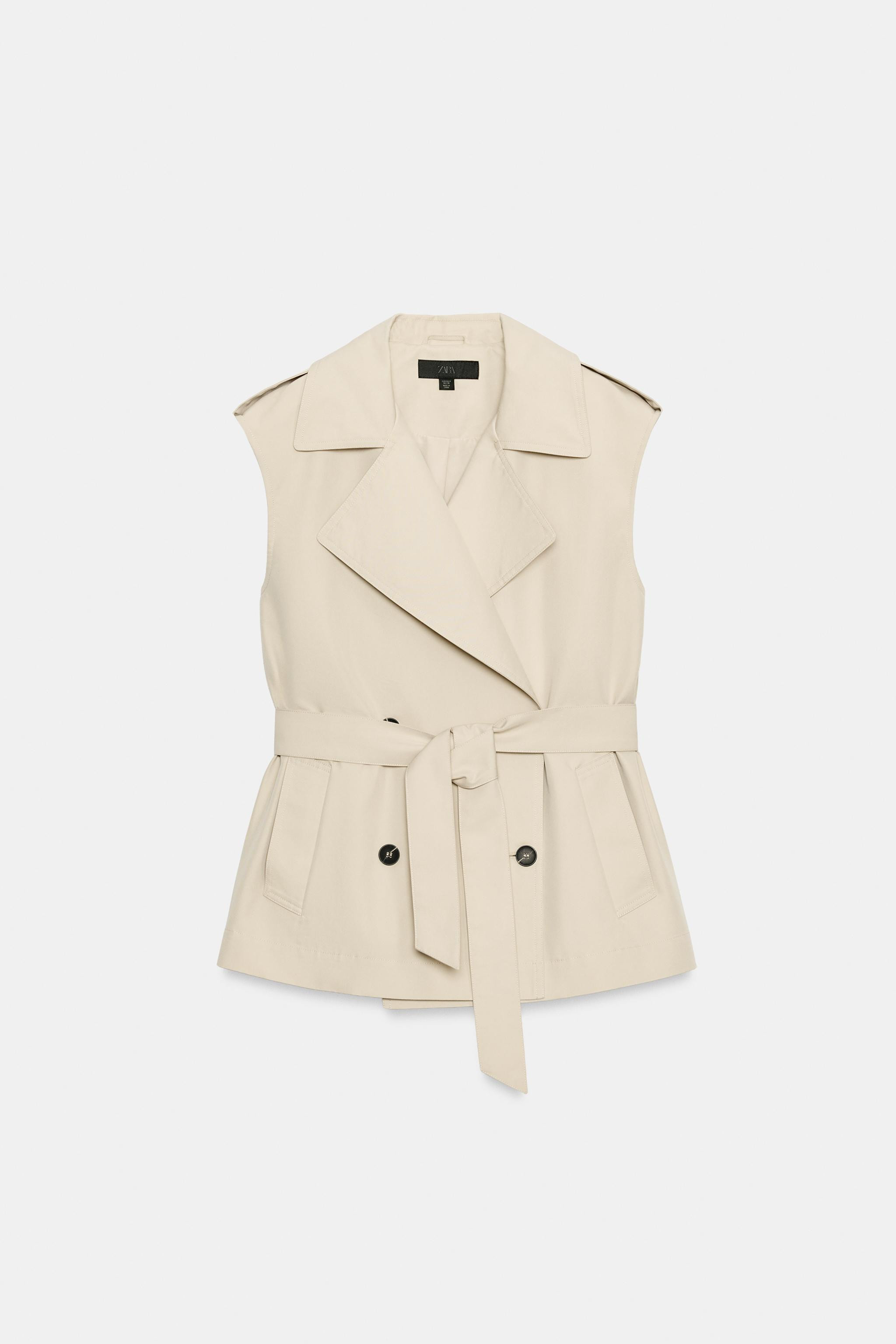Model height: 179 cmWaistcoat with a regular collar and sleeveless design, featuring shoulder tab... | Zara NL