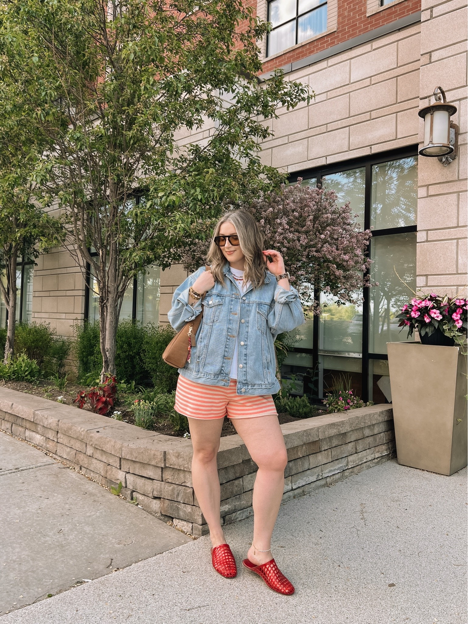 Comfy spring to summer outfit! Wearing my usual L in the striped knit shorts. Sized up to XL in the denim jacket for an oversized fit. Linked similar white tees. Jelly shoes are quite comfy, I’m a 9.5-10 and wear a 10. Canadian shoe link under “similar products”

#LTKsummer #LTKsale #LTKstyletip