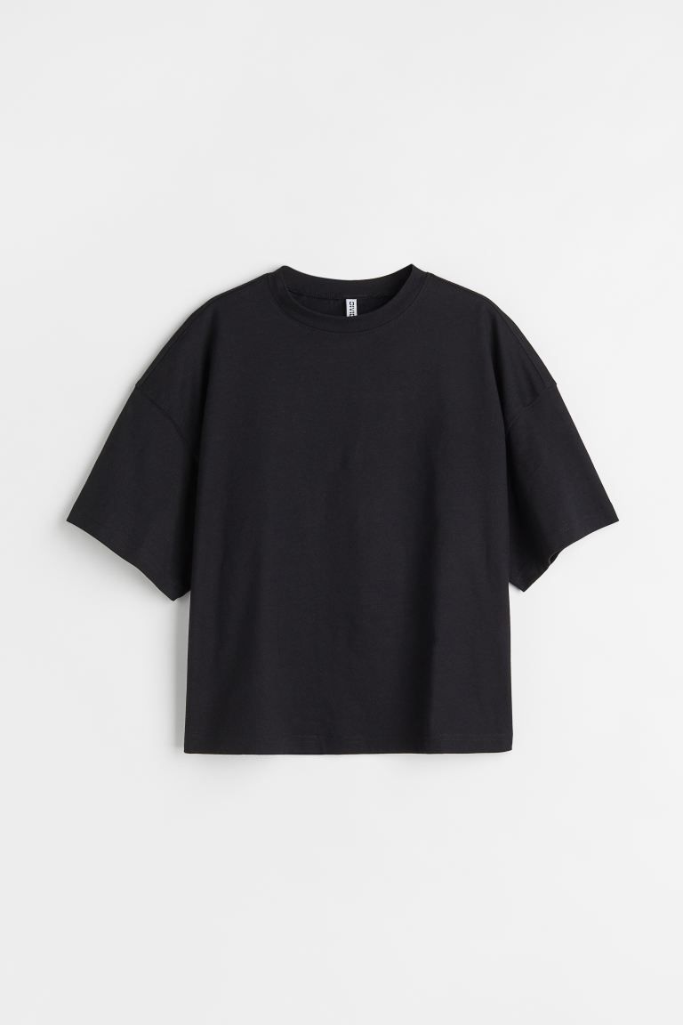 Conscious choice  Boxy T-shirt in soft cotton jersey. Ribbed crew neck, dropped shoulders, and wi... | H&M (US + CA)