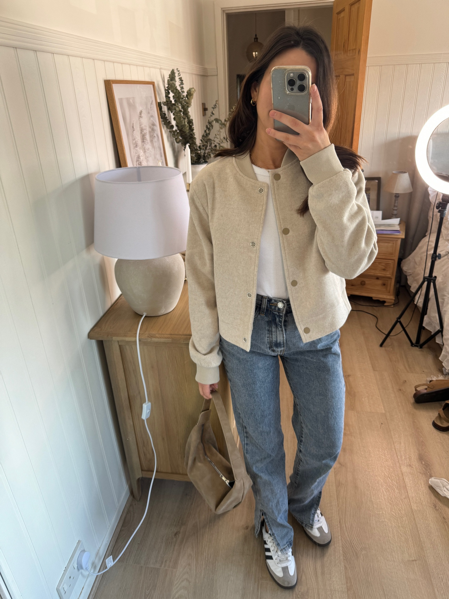 Spring everyday outfit 😍 

Ecru bomber jacket from threadbare - wearing a size 10

Pretty little thing petite wide leg jeans 

Adidas sambas 

White cos tshirt 

Pretty little thing taupe handbag 



#LTKfindsunder50 #LTKSeasonal #LTKstyletip