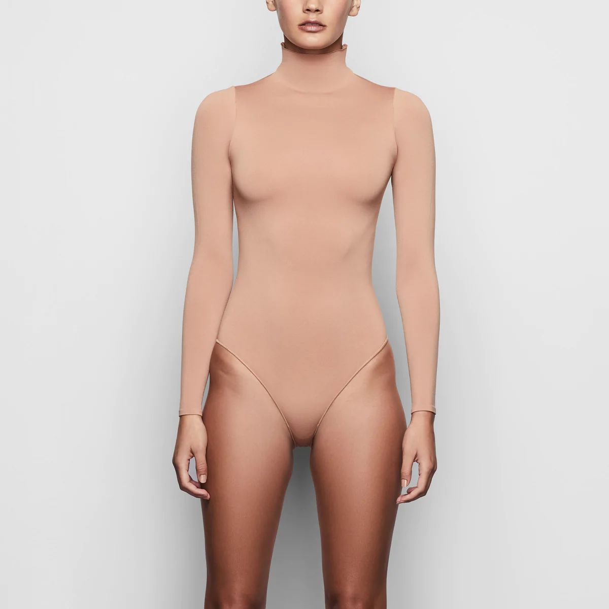 ESSENTIAL MOCK NECK LONG SLEEVE BODYSUIT | SKIMS (US)