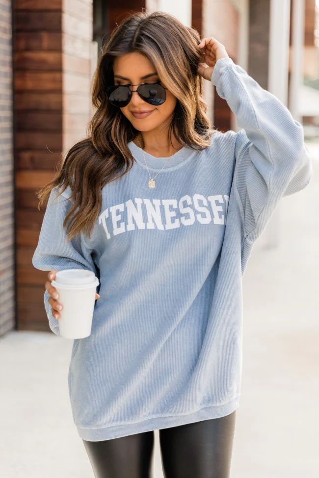 This light bluestate graphicsweatshirt is perfect for chilly casual days in! Featuring a light bl... | Pink Lily