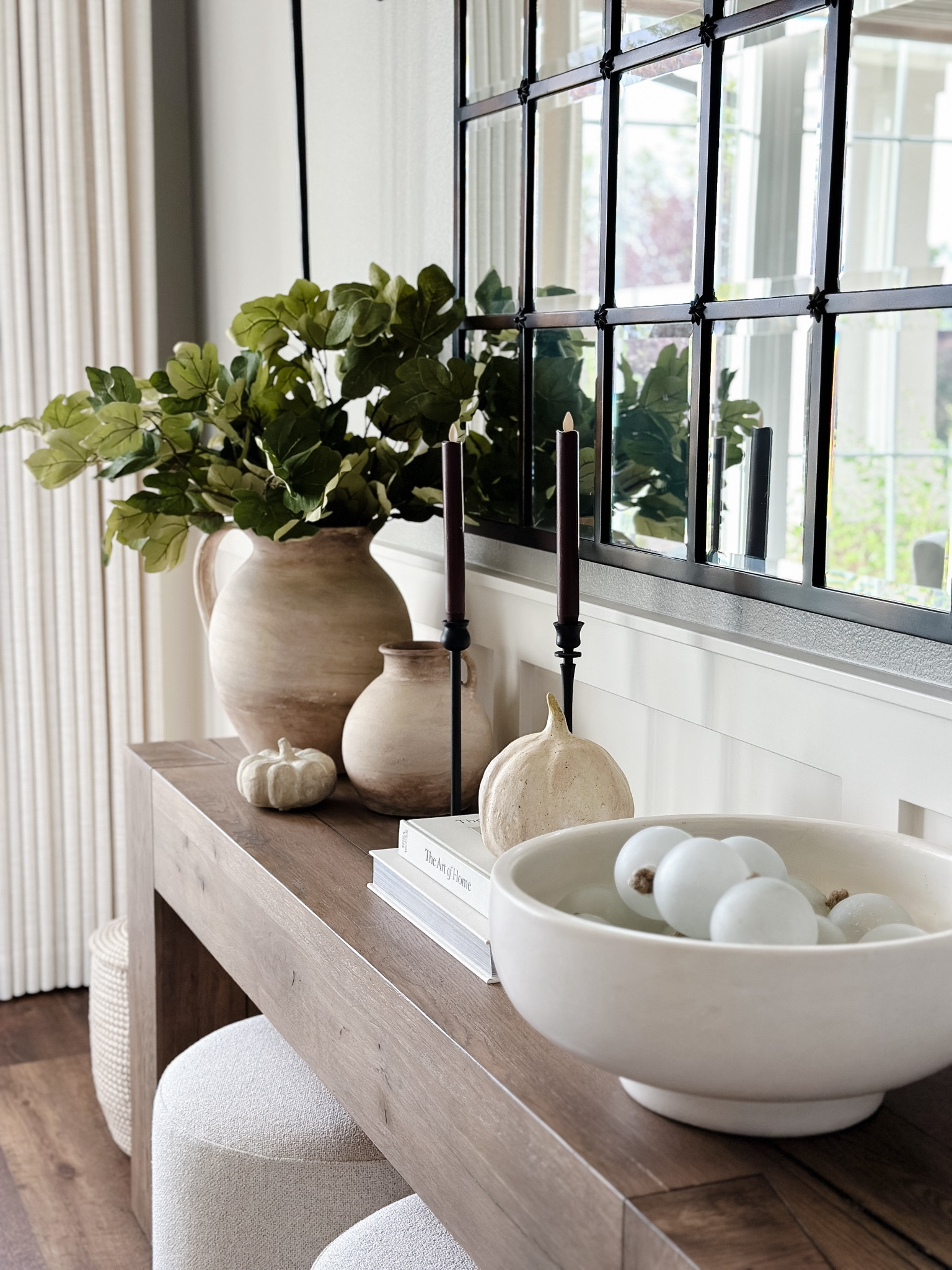 Fig stems | Weathered Ceramic vases | fall home decor | decorative bowl | console table decor | upholstered swivel ottomann

#LTKHome #LTKSaleAlert #LTKSeasonal