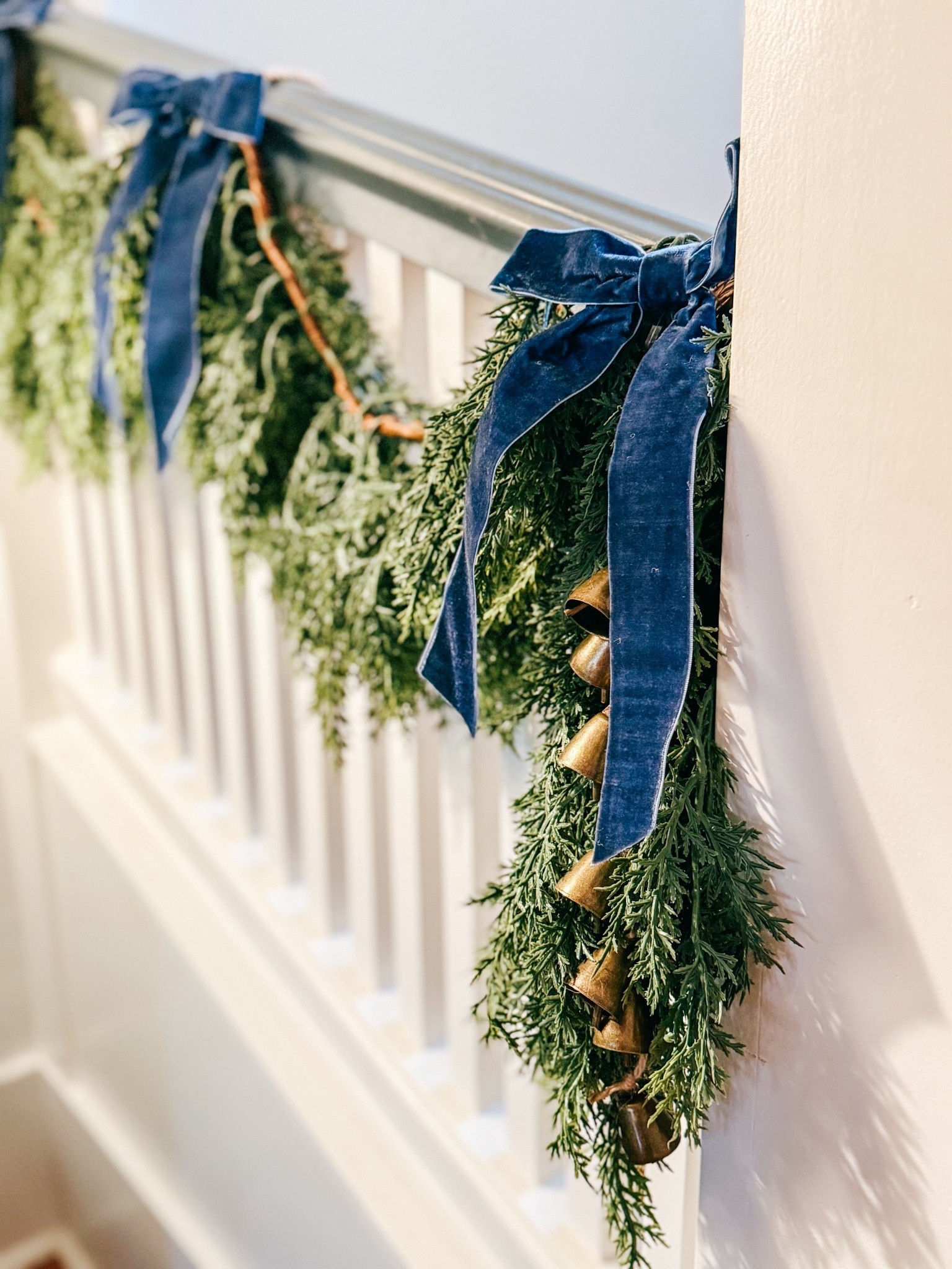 Staircase garland reveal! A budget friendly WIN for your Holiday decor. 

#LTKSeasonal #LTKHome #LTKHoliday