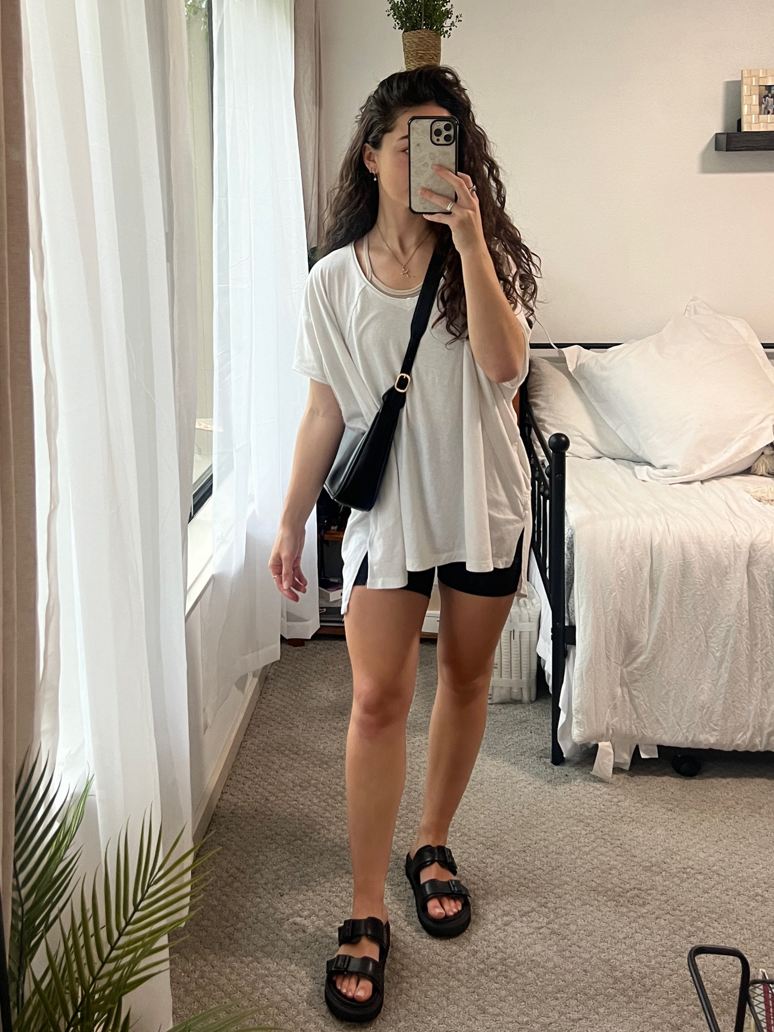 OOTD to run some errands! Tna butter from Aritzia will forever be a fav for me, great prices for the comfiest bike shorts/athleisure! Wearing a small in this shirt but it’s very oversized so an XS would work for me - it’s the only size left in stock of this color but they have other super cute colors! I’ve had this tee since 2021 and it’s perfect to layer over sports bras/tanks & wear with bike shorts, running shorts, & leggings! 

#LTKfindsunder100 #LTKActive #LTKfindsunder50