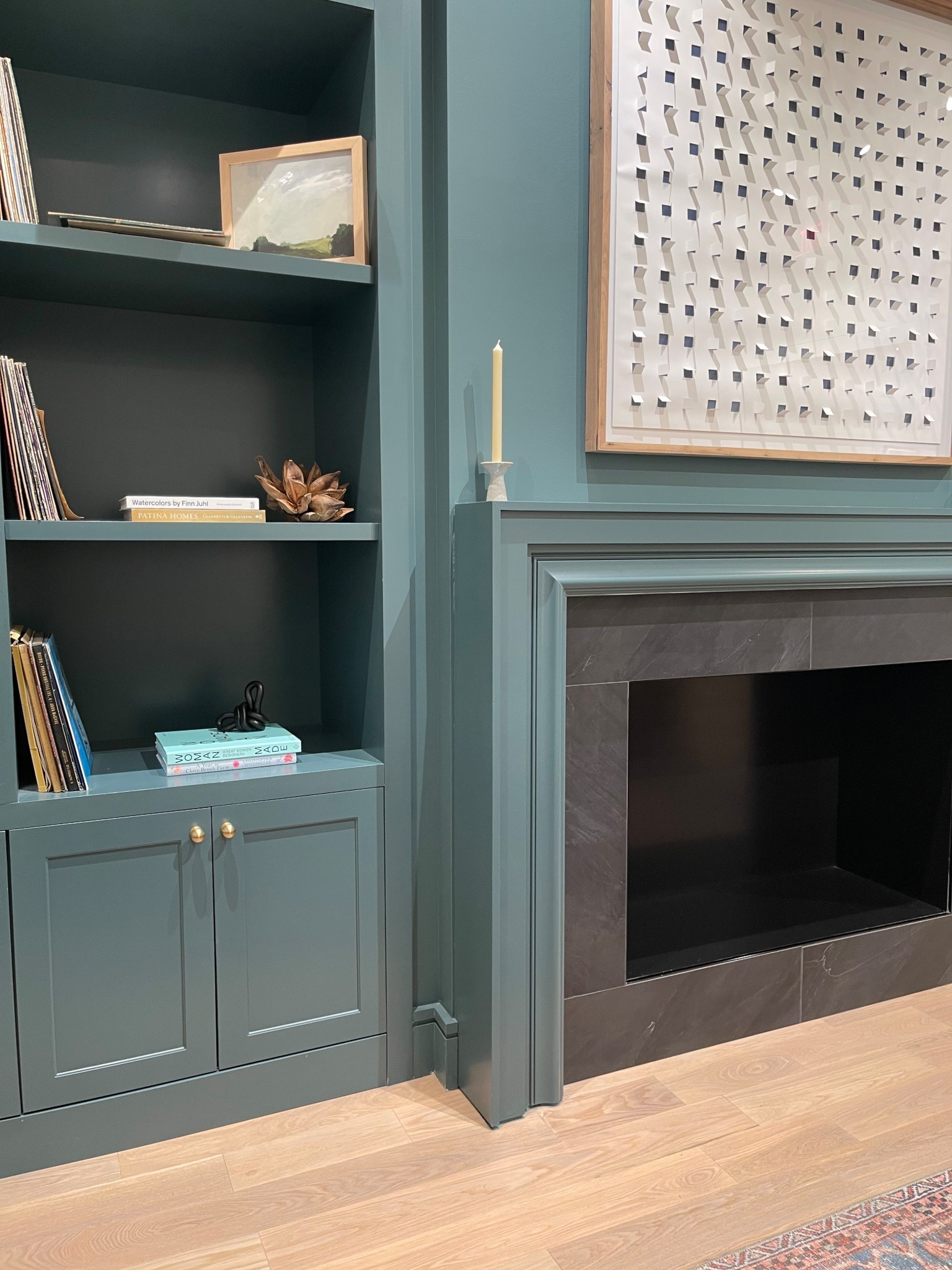 Modern fireplace surround with clean lines and simple detailing 

#LTKHome #LTKMothersDay
