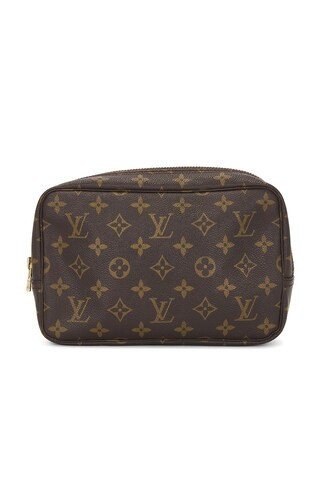 Louis Vuitton Monogram Trousse Toilette 23 Pouch in Brown | FWRD 