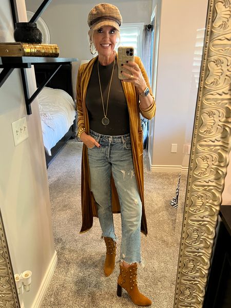 Birthday dinner outfit

Spanx ribbed bodysuit
Free people Maggie jean
Cecilia New York stud booties
Velvet duster mines boutique (linked similar and cheaper) 
Gold jewelry 
Buxton newspaper hat- linked similar 
#denim #bodysuits 

#LTKstyletip
