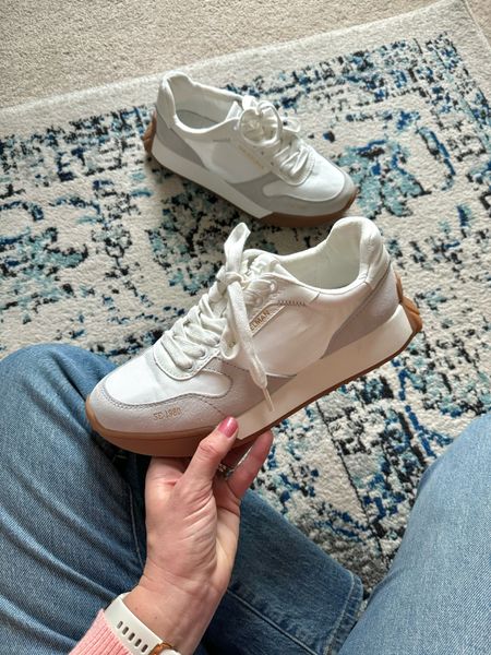 The perfect white sneakers do exist! Finally found a great pair for spring and summer. My little hunt is over. These are:
-supportive
-comfortable
-cute
-versatile

I was looking for sneakers that weren’t completely all white and the taupe trim and stitching on these keeps them neutral but a little different - just what I wanted!

I got my normal sneaker size in these 

#LTKSeasonal #LTKshoecrush #LTKfindsunder100
