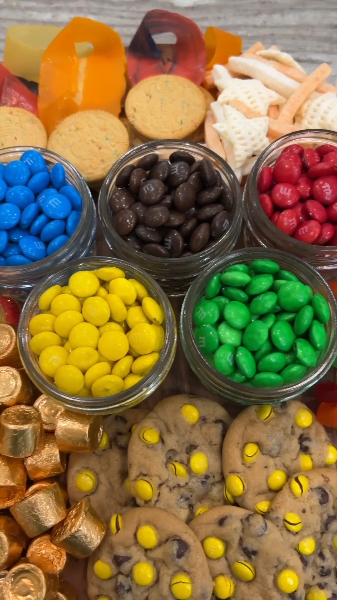 You’ll feel like a champion serving this super cute Olympics Snack Board to your family and friends. Everyone will love the festive mix of salty and sweet snacks in fun Olympics-inspired shapes. It’s snacking gold!

#LTKSeasonal