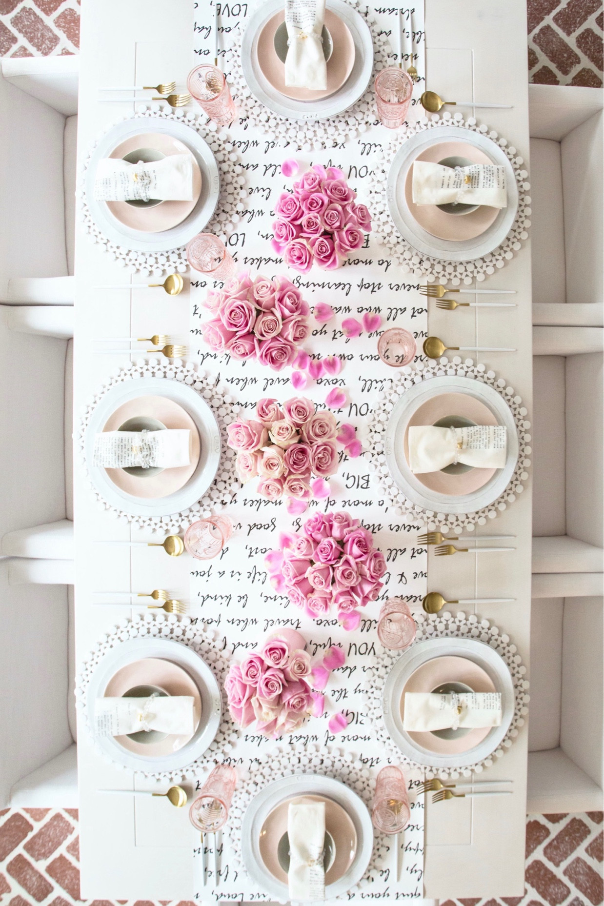 Created a table runner made from a wallpaper roll with love quotes for Valentine’s Day. It’s also wipeable and reusable! 

#LTKHome #LTKSeasonal