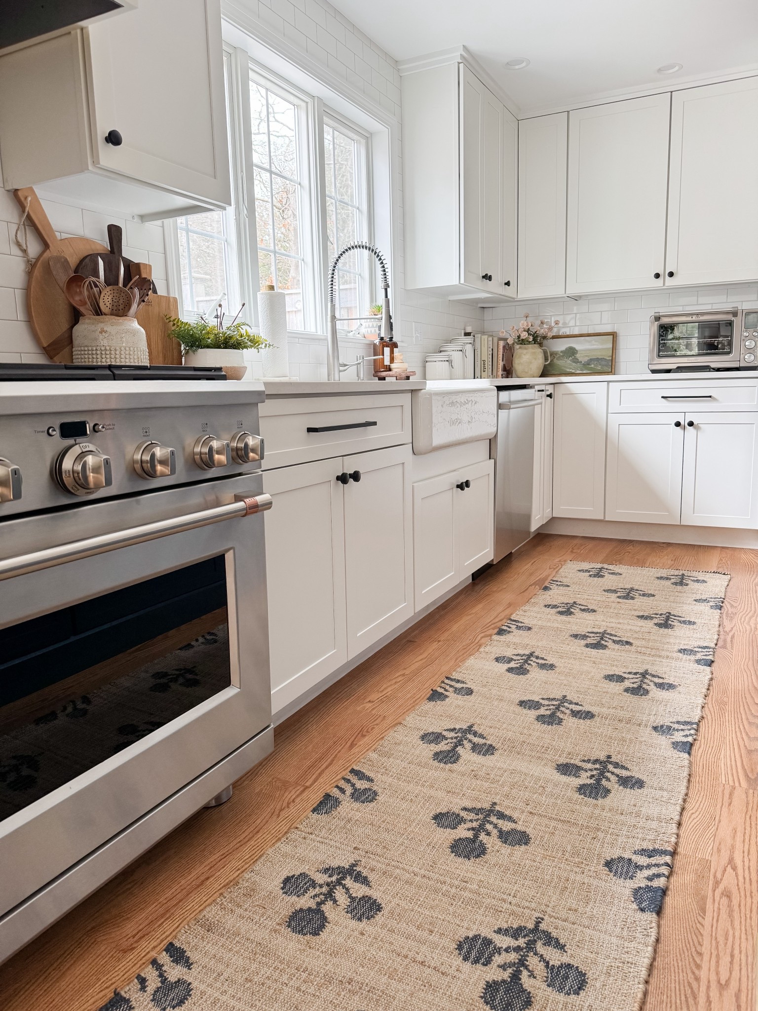 Coastal kitchen styled with navy island, white cabinets, neutral runner rug, and simple kitchen decor for a light and layered coastal space.

coastal kitchen decor, navy kitchen island, neutral kitchen runner rug, white cabinet kitchen, coastal kitchen styling, neutral kitchen decor, light coastal kitchen design, kitchen island runner rug, sherricalnanhome

#LTKHome