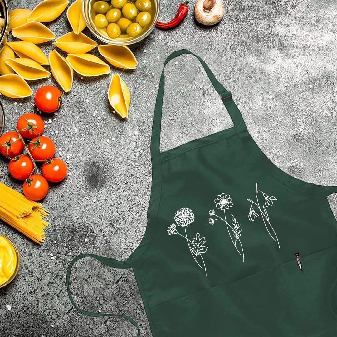 Add a heartfelt, personal touch to everyday cooking with this custom Birth Month Flower Apron from AutumnRainClothing. Printed in the USA and made with premium quality materials, it features a comfortable unisex fit, sturdy side seams, and handy pockets—perfect for anyone who loves spending time in the kitchen. Personalize it with a birth flower to create a meaningful gift for birthdays, Mother’s Day, Valentine’s Day, or the holidays. With fast production and quick shipping, it’s an easy way to give a thoughtful, practical gift that’s both sentimental and stylish. #CustomApron #BirthFlowerGift #KitchenStyle #PersonalizedGifts #EtsyFinds #GiftForHer #CookingEssentials

#LTKGiftGuide #LTKHoliday #LTKfoodie