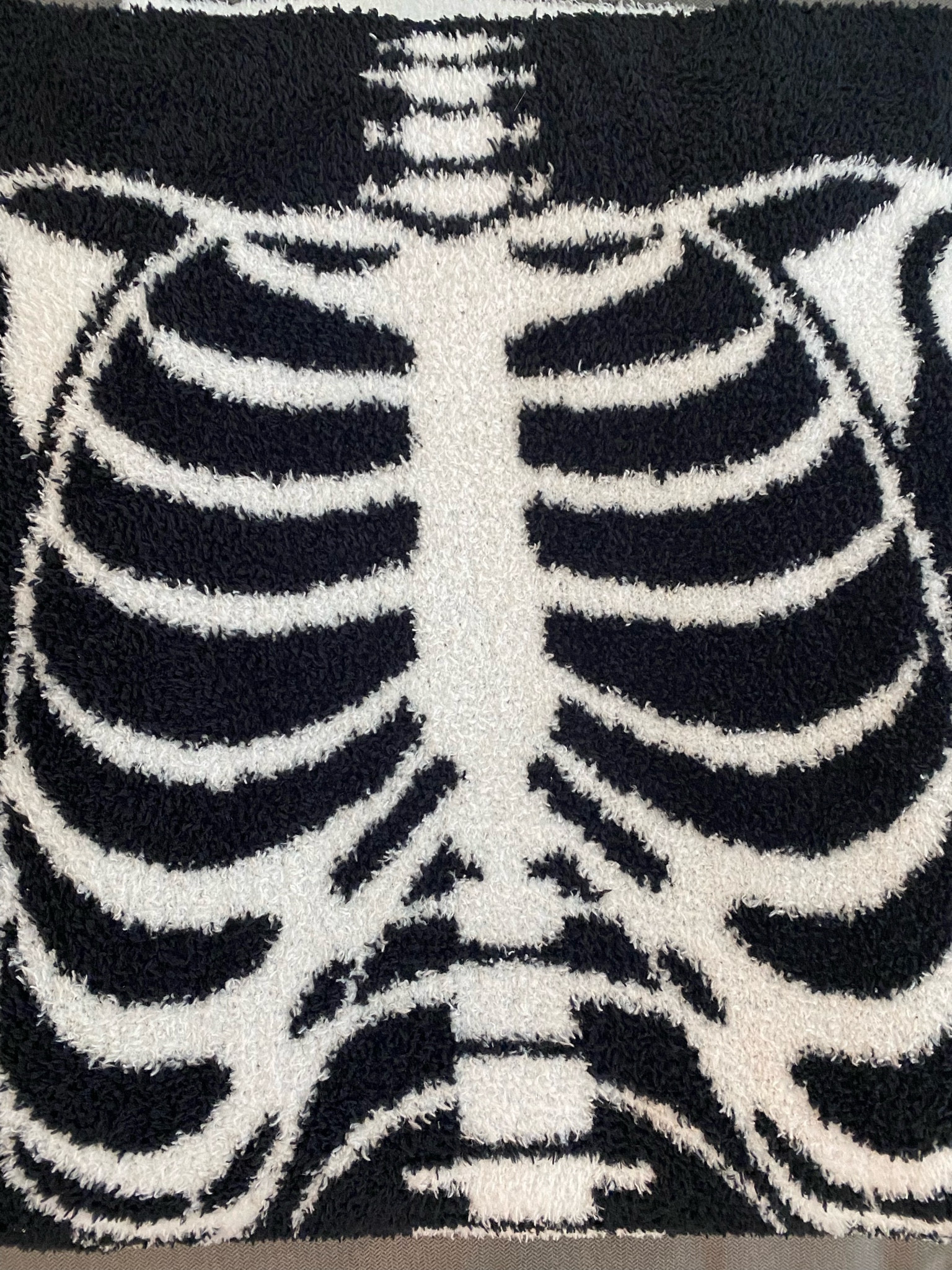 Skeleton body feather knit blanket. Found this blanket at TJ Max but wasn’t able to find the product link. 

#LTKFindsUnder50 #LTKSeasonal #LTKHome