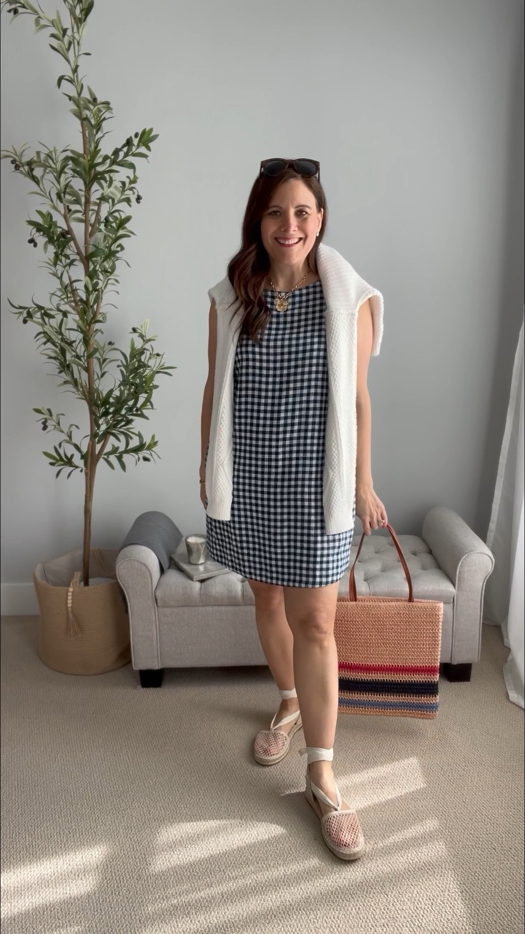 Nothing says summer like a gingham dress. It has that retro, Jackie O. charm with a classic A-line shape that's perfect for my pear shape (Size M). It’s currently 60% off and under $20. These espadrilles are so charming, and a white cotton sweater is perfect for chilly A/C. #SummerOutfit

#LTKMidsize #LTKFindsUnder50 #LTKSaleAlert