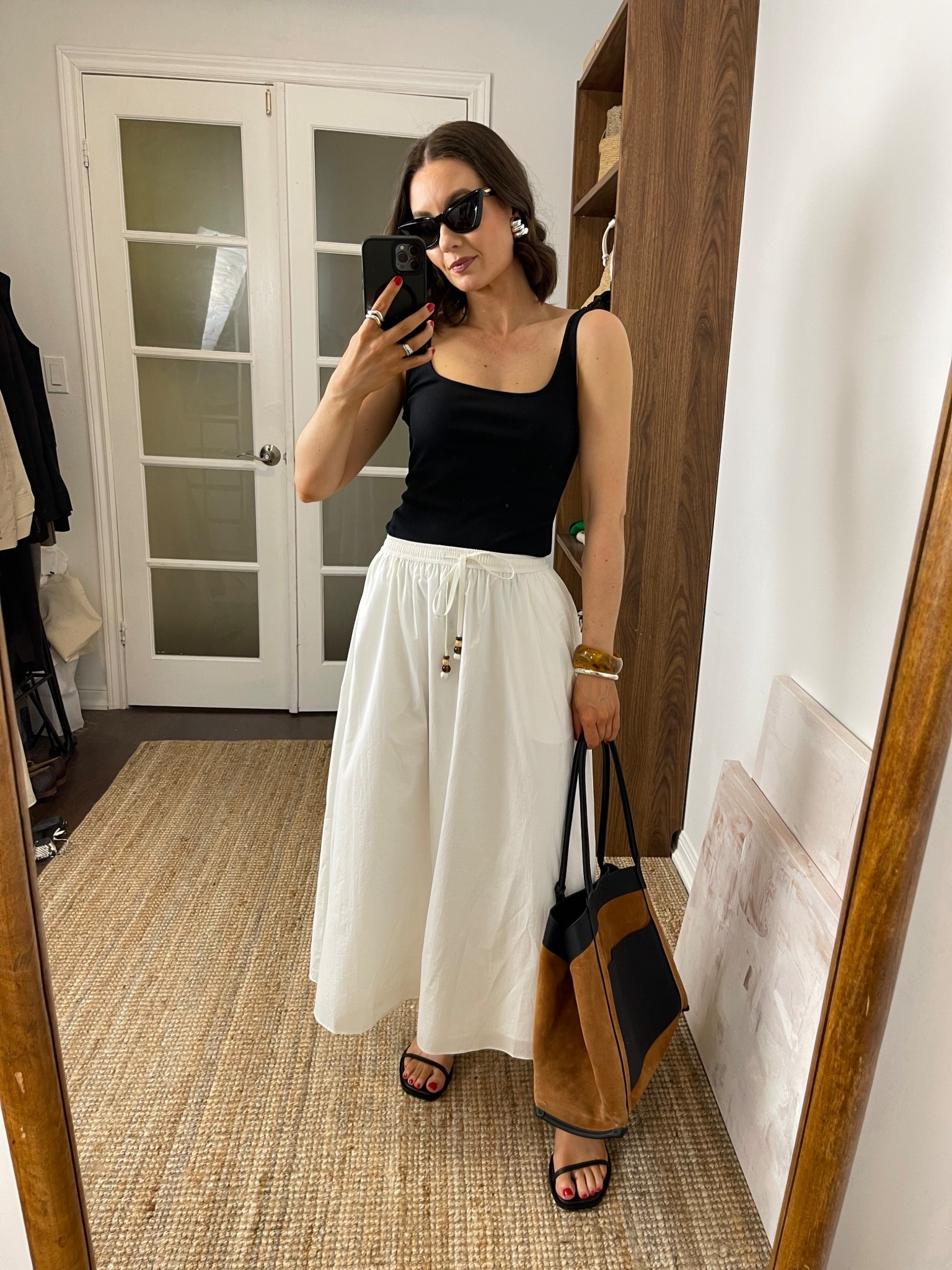Black tank top, white skirt, black sandals, suede tote bag

Use Sansha15 for Fabrique 

#LTKTravel #LTKStyleTip #LTKSeasonal