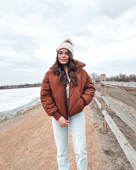 Brown puffer jacket with Abercrombie jeans and white hat

#LTKSale #LTKSeasonal #LTKunder100