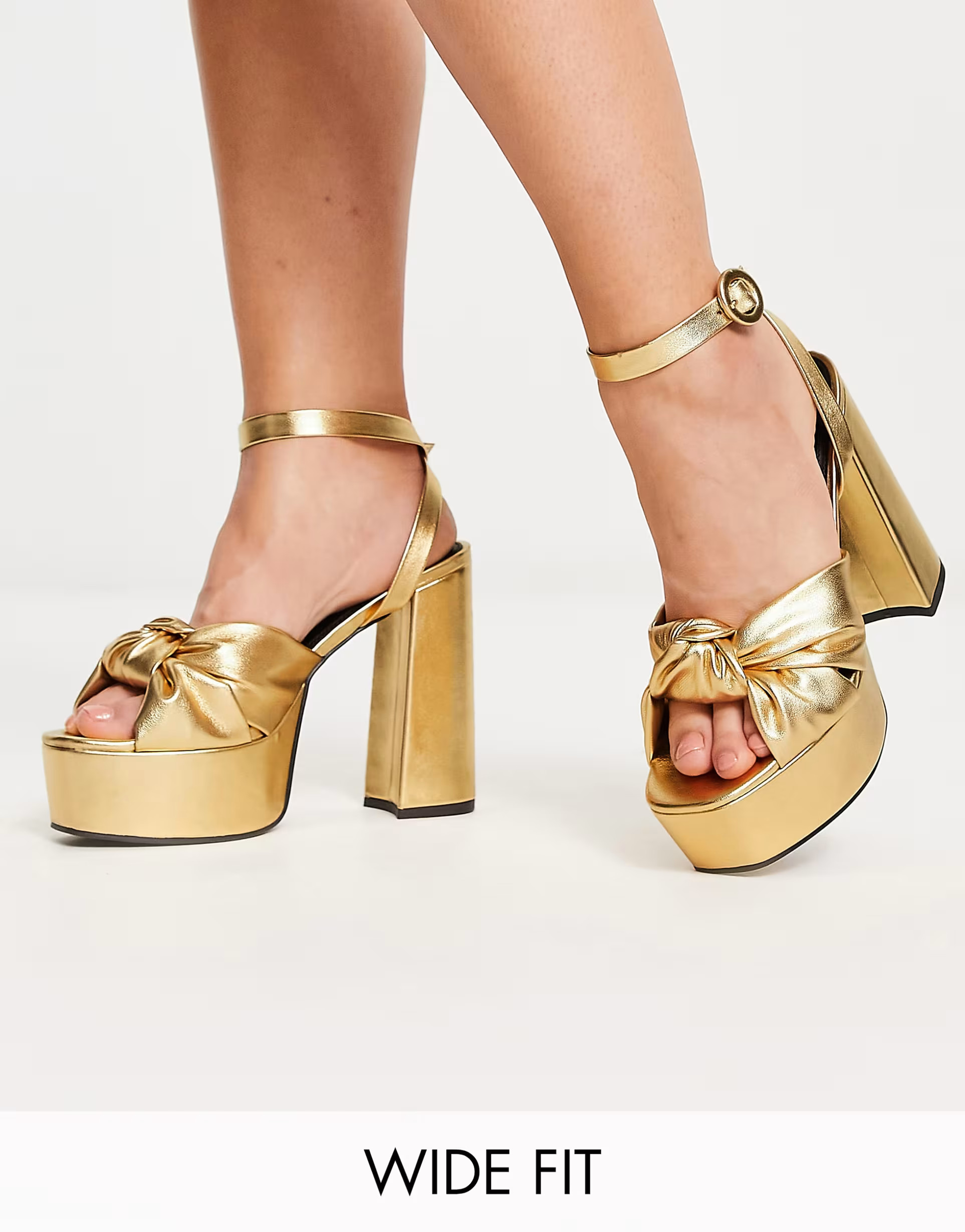ASOS DESIGN Wide Fit Natia knotted platform heeled sandals in gold | ASOS | ASOS (Global)