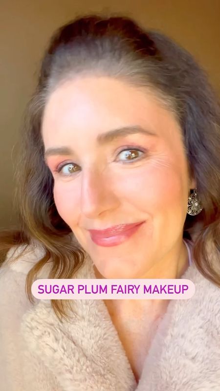 SUGAR PLUM FAIRY MAKEUP 

Trends know no age limits! 💁‍♀️✨ This season, let's break free from the ordinary and dive into the whimsical world of sugarplum fairy makeup! 🧚‍♀️💜
Say goodbye to the usual neutrals and red lips, and say hello to a mesmerizing palette of pinks and plums! 🌸💜✨ Make this enchanting look your own. 💫✨ 
This look is all about glowy skin, and pink and purple touches. All you really need is an illuminating foundation, a pink, or a plum, eye shadow palette, pink blush (I used 2 blushes) and a pink or a plum lip.

#LTKHoliday #LTKSeasonal #LTKVideo